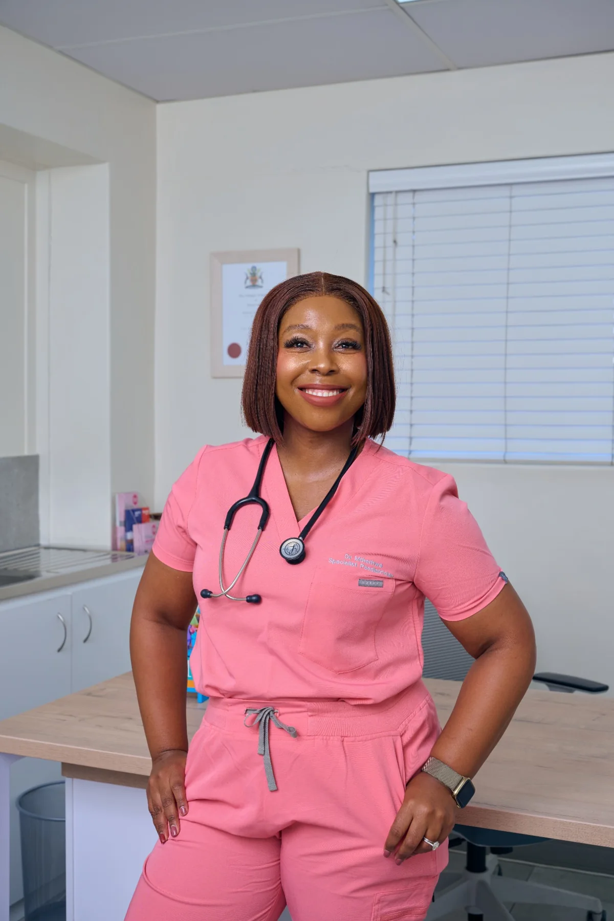 Dr. Zinzi Mthethwa standing in her consultation room